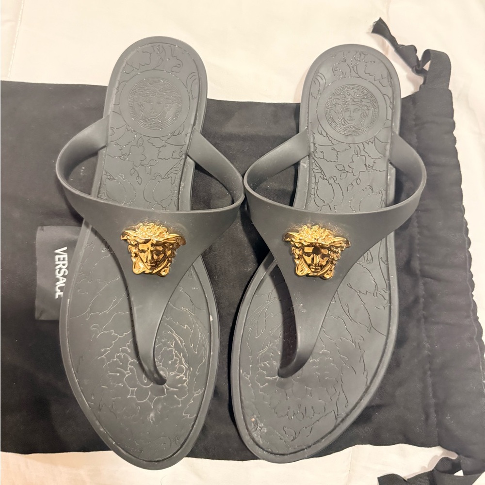 Versace Black Thong Sandals with Gold Medusa Accent